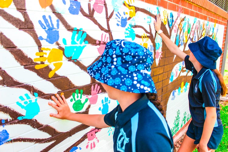 Every student painted their hand on this wall in celebration of Harmony Day.